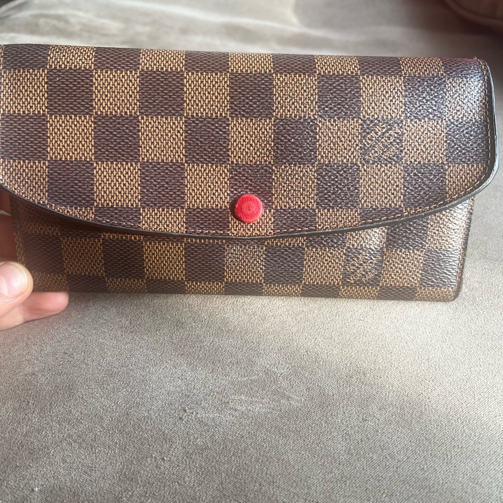 Louis Vuitton wallet.